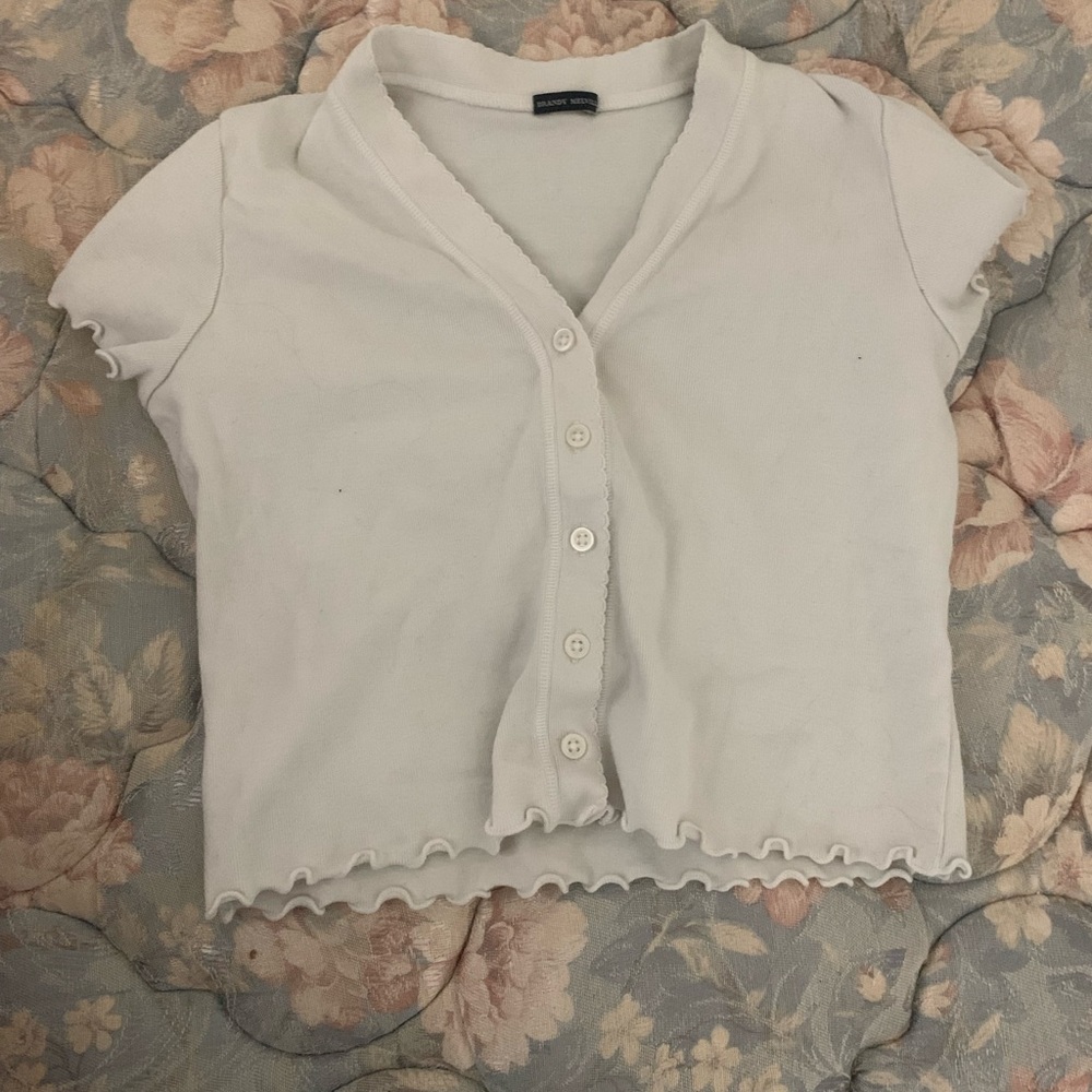 brandy melville white ruffle button up short sleeved top